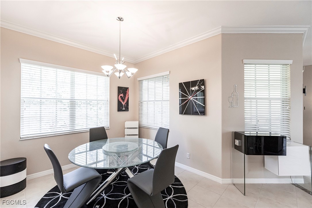 9013 West Ridge Court Fort Myers, FL 33912 - Photo 19 of 43 a dining room with furniture and window