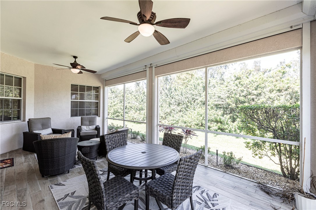 9013 West Ridge Court Fort Myers, FL 33912 - Photo 35 of 43 a view of a dining room with furniture window and outside view