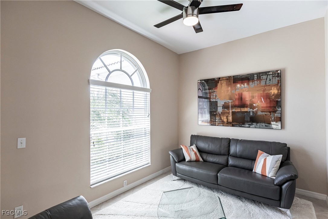 9013 West Ridge Court Fort Myers, FL 33912 - Photo 8 of 43 a living room with furniture and a window