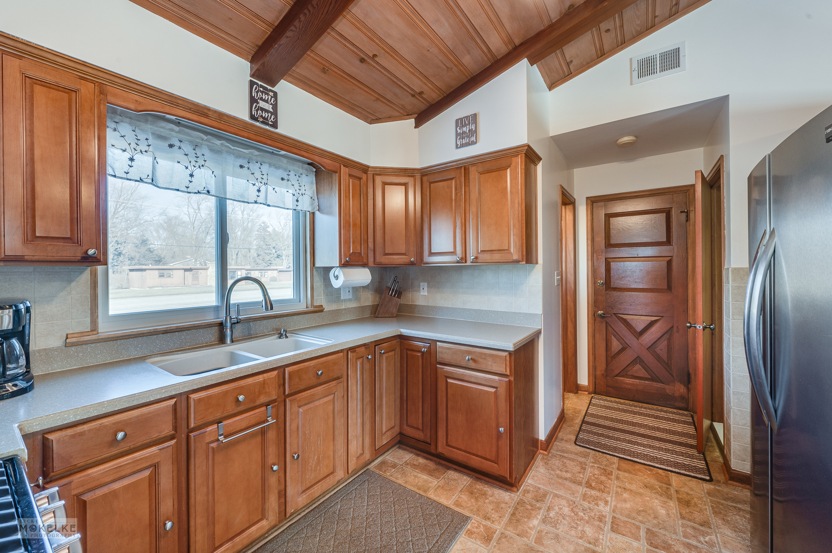 2512 Caton Farm Road Joliet, IL 60435 - Photo 20 of 41 a kitchen with a sink and cabinets