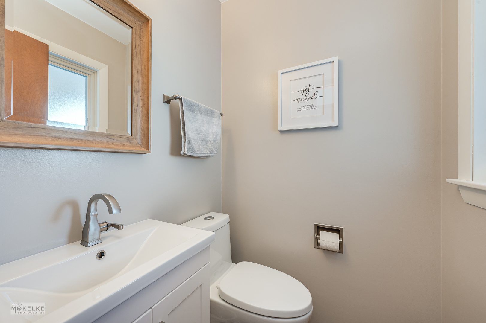 2512 Caton Farm Road Joliet, IL 60435 - Photo 23 of 41 a bathroom with a toilet sink and mirror