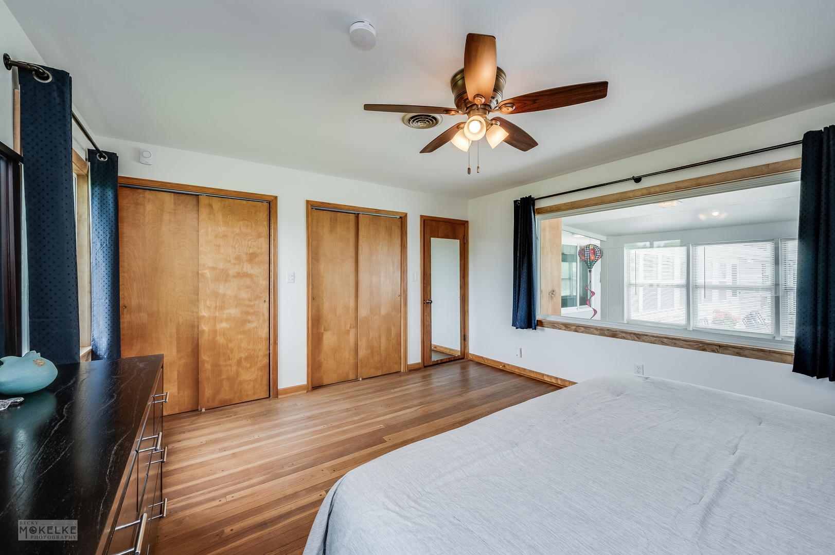2512 Caton Farm Road Joliet, IL 60435 - Photo 26 of 41 a view of an empty room with a window and wooden floor