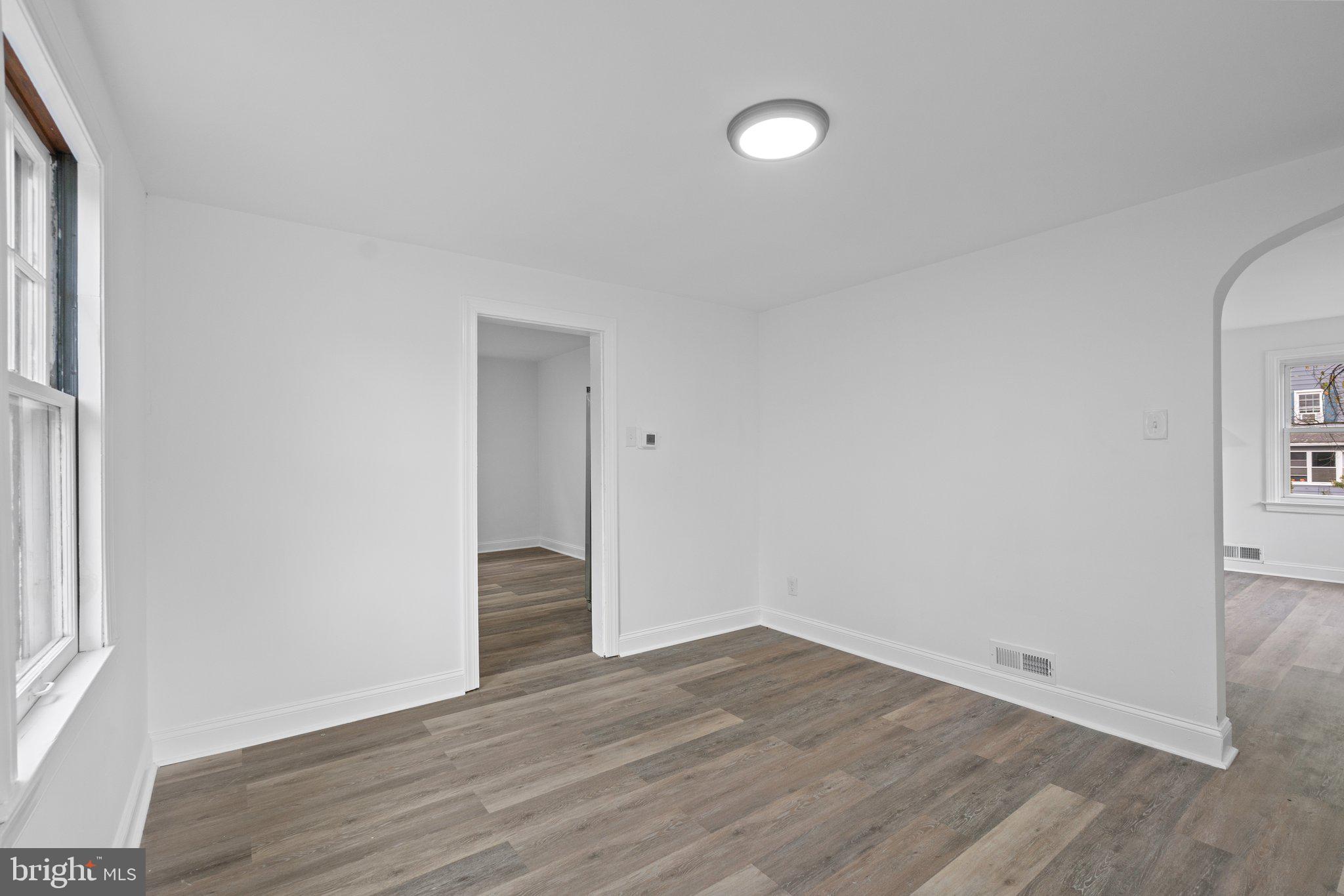300 Avon Road Hagerstown, MD 21740 - Photo 11 of 28 a view of an empty room with wooden floor and a window