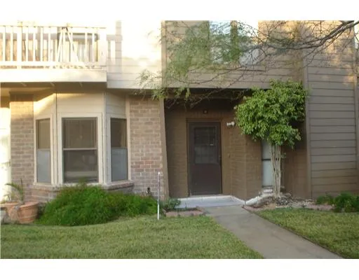 a view of a porch with a yard