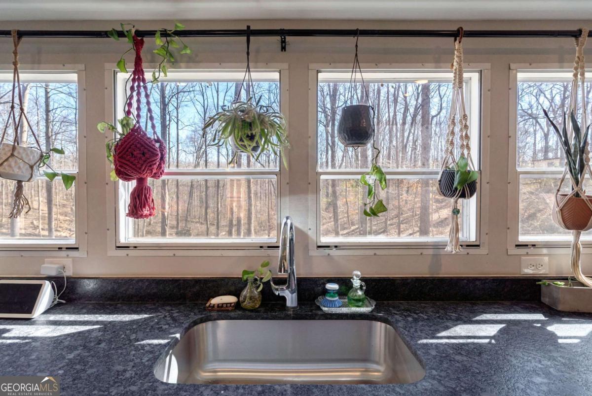 218 Sol Drive Commerce, GA 30529 - Photo 15 of 48 a bathroom with a sink and a window