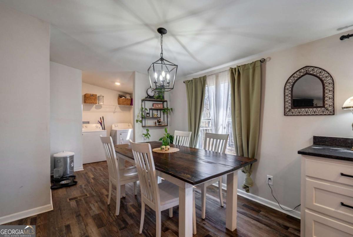 218 Sol Drive Commerce, GA 30529 - Photo 17 of 48 a dining room with furniture and window