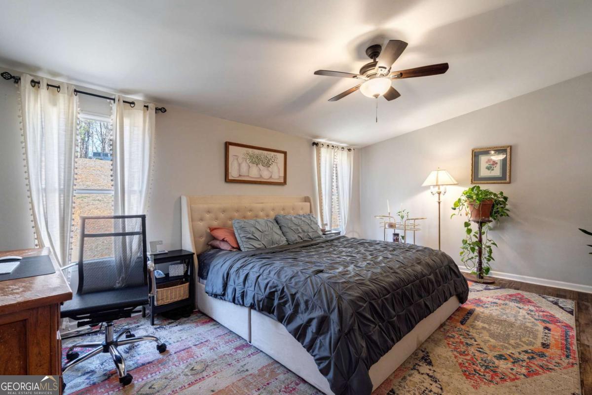 218 Sol Drive Commerce, GA 30529 - Photo 21 of 48 a bedroom with a bed and a window