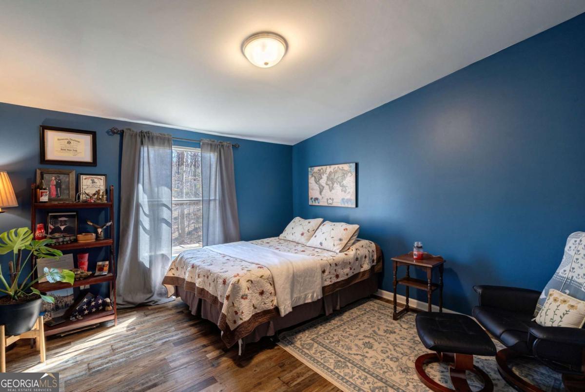 218 Sol Drive Commerce, GA 30529 - Photo 29 of 48 a bedroom with a bed and a window