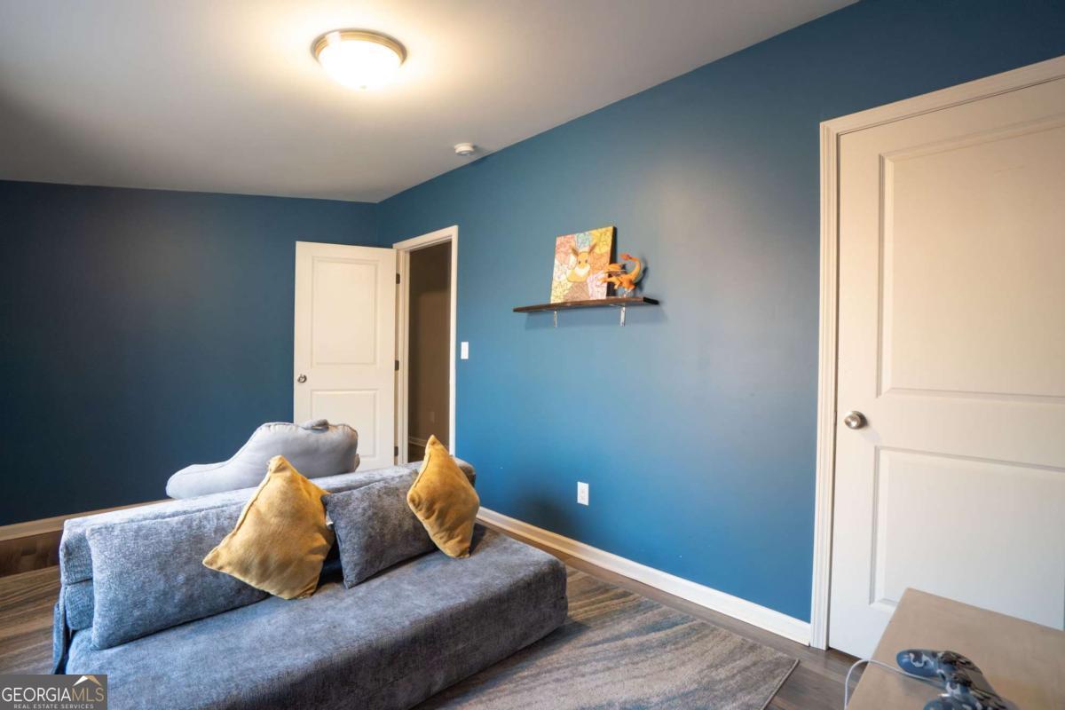 218 Sol Drive Commerce, GA 30529 - Photo 32 of 48 a bed room with furniture and a window