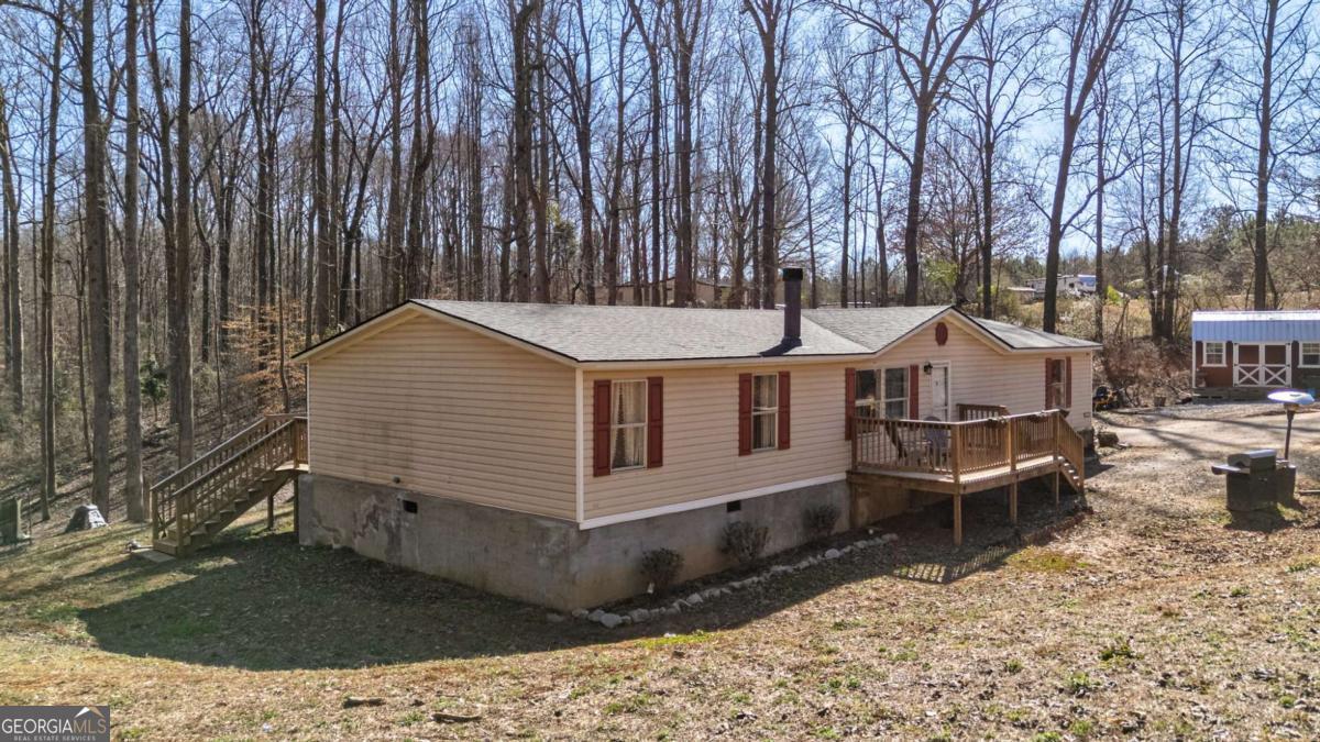 218 Sol Drive Commerce, GA 30529 - Photo 42 of 48 a backyard of a house with barbeque oven