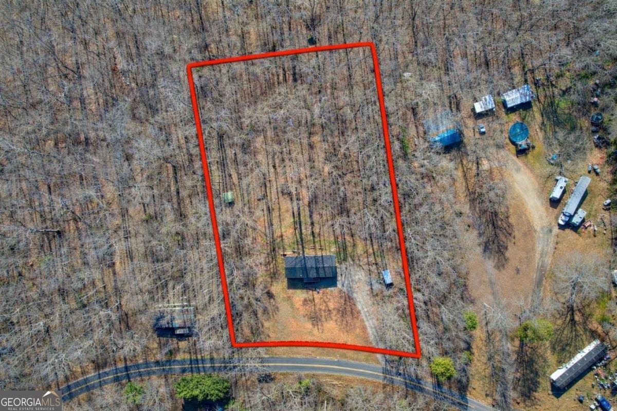 218 Sol Drive Commerce, GA 30529 - Photo 46 of 48 a bathroom with a shower and a mirror