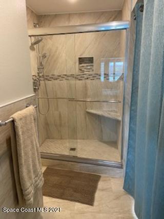 146 Bimini Road Cocoa Beach, FL 32931 - Photo 15 of 41 a bathroom with a shower