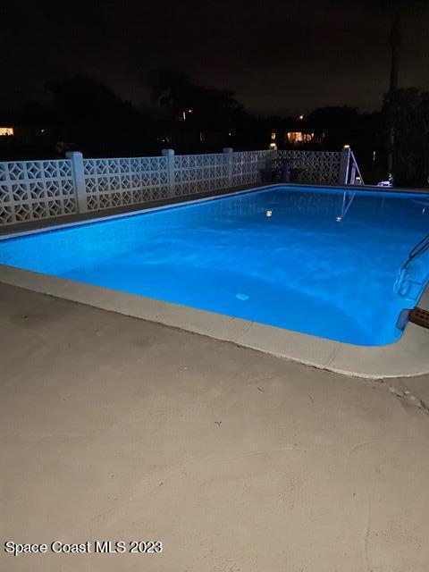 146 Bimini Road Cocoa Beach, FL 32931 - Photo 27 of 41 a view of swimming pool outdoor seating