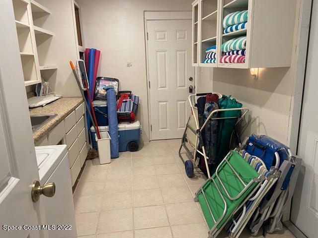 146 Bimini Road Cocoa Beach, FL 32931 - Photo 34 of 41 a view of a room with gym equipment