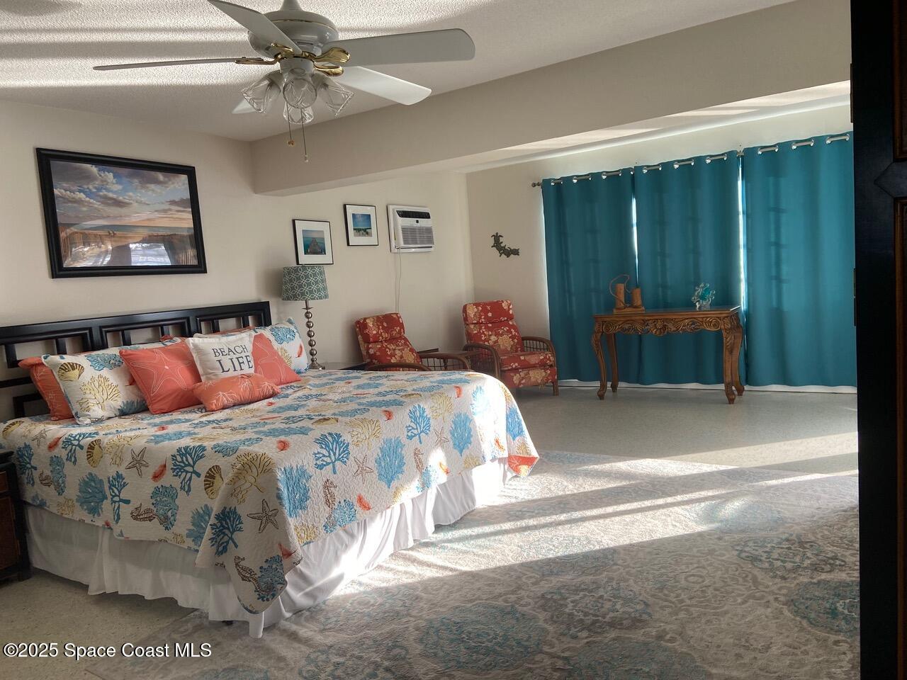 146 Bimini Road Cocoa Beach, FL 32931 - Photo 9 of 41 a bedroom with bed and window