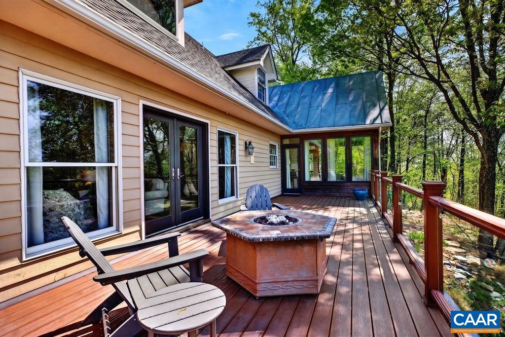 1059 Bryant Mountain Road Roseland, VA 22967 - Photo 41 of 58 a view of a two chairs in the deck