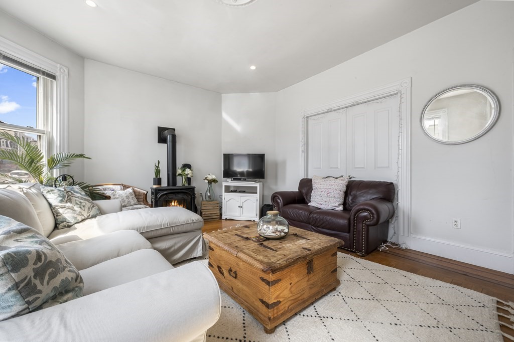 866 East 5th Street, Unit 1 Boston, MA 02127 - Photo 3 of 23 a living room with furniture