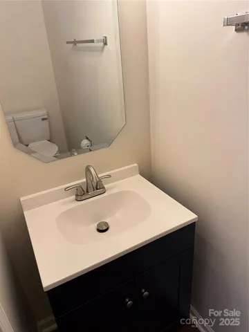 a close up of a sink and a mirror