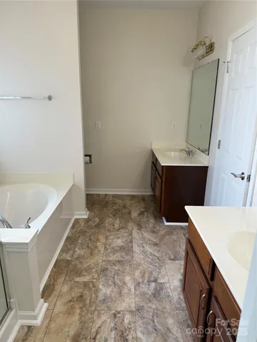 a bathroom with a sink and a tub
