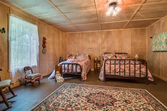 135 Shop Road Dunlap, TN 37327 - Photo 21 of 23 a bedroom with bed chair and window