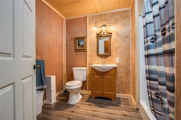 135 Shop Road Dunlap, TN 37327 - Photo 22 of 23 a bathroom with a sink and a toilet