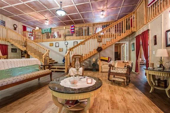 135 Shop Road Dunlap, TN 37327 - Photo 6 of 23 a living room with furniture and a dining table