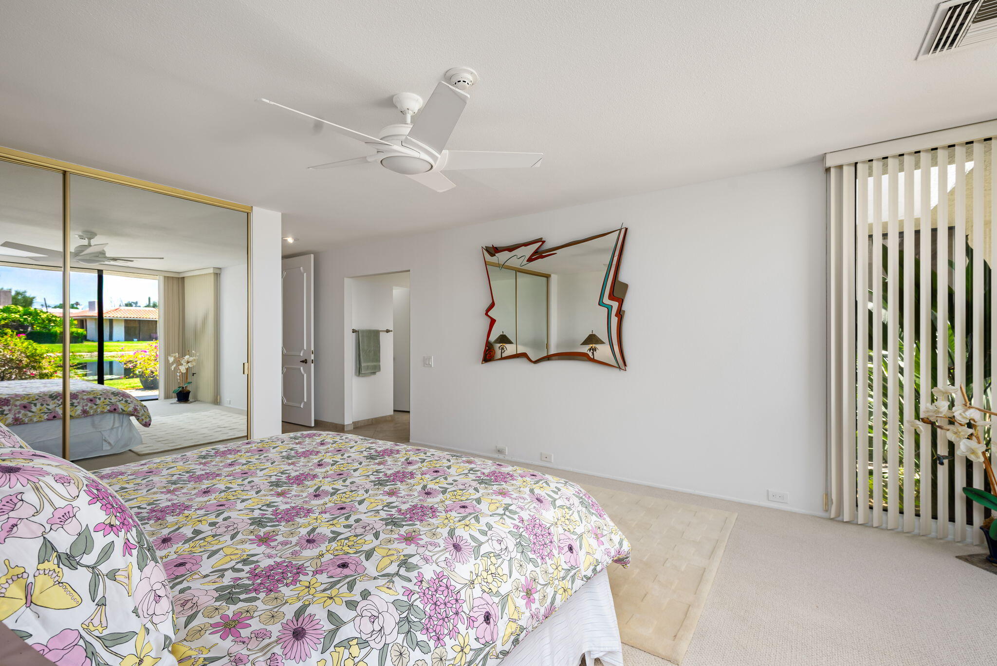 4 Reed Court Rancho Mirage, CA 92270 - Photo 16 of 42 a bedroom with a bed and a large window