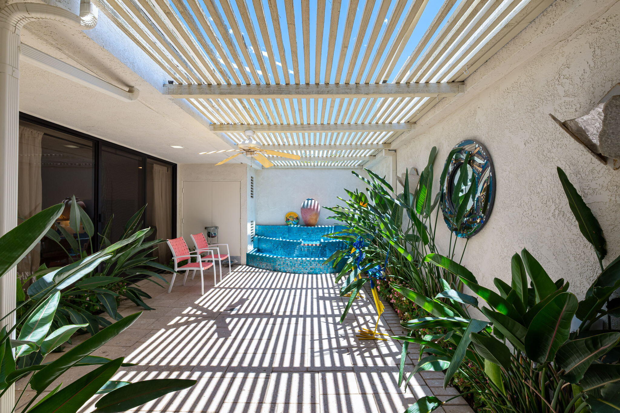 4 Reed Court Rancho Mirage, CA 92270 - Photo 21 of 42 a view of a porch with furniture