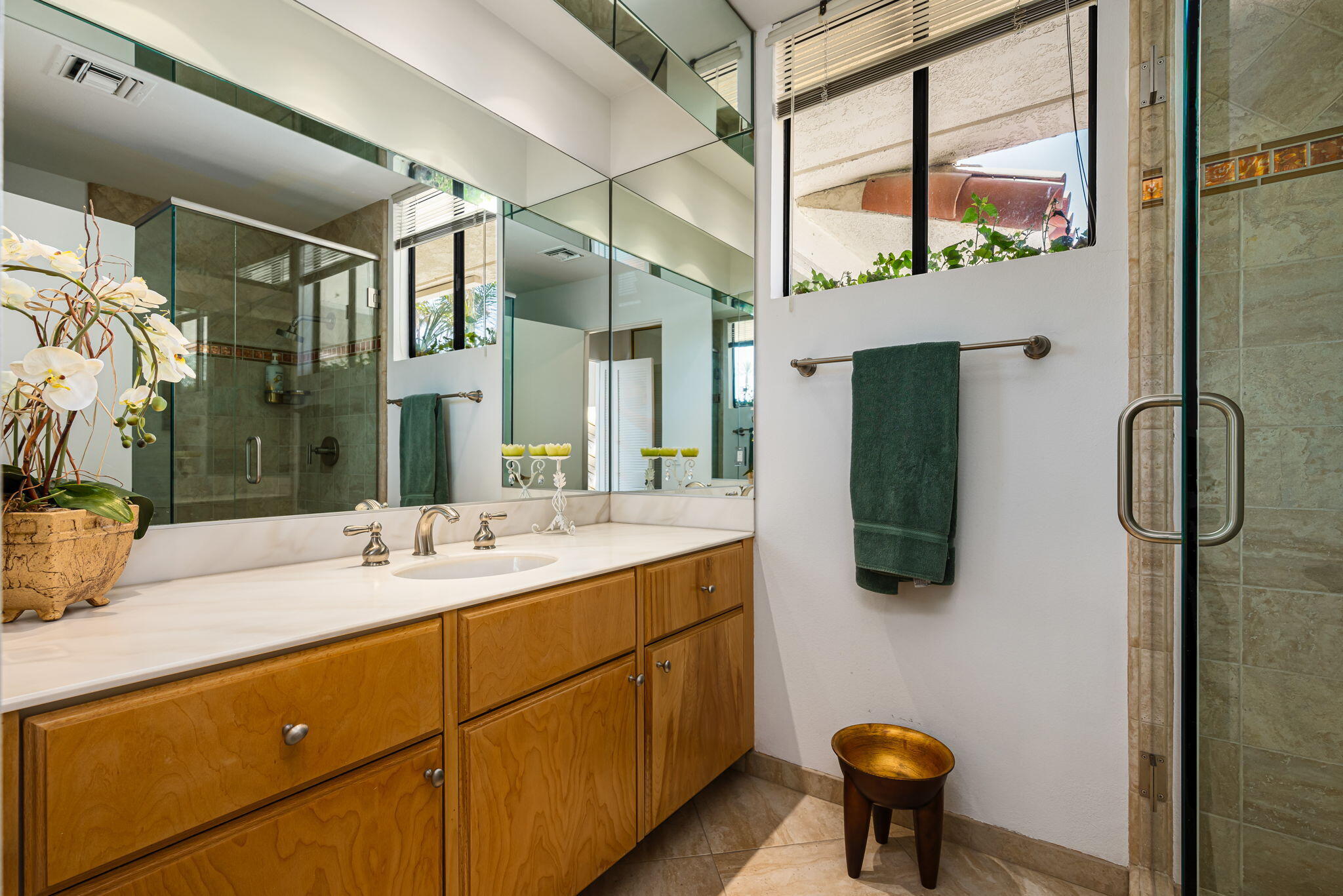 4 Reed Court Rancho Mirage, CA 92270 - Photo 27 of 42 a bathroom with a sink and a mirror