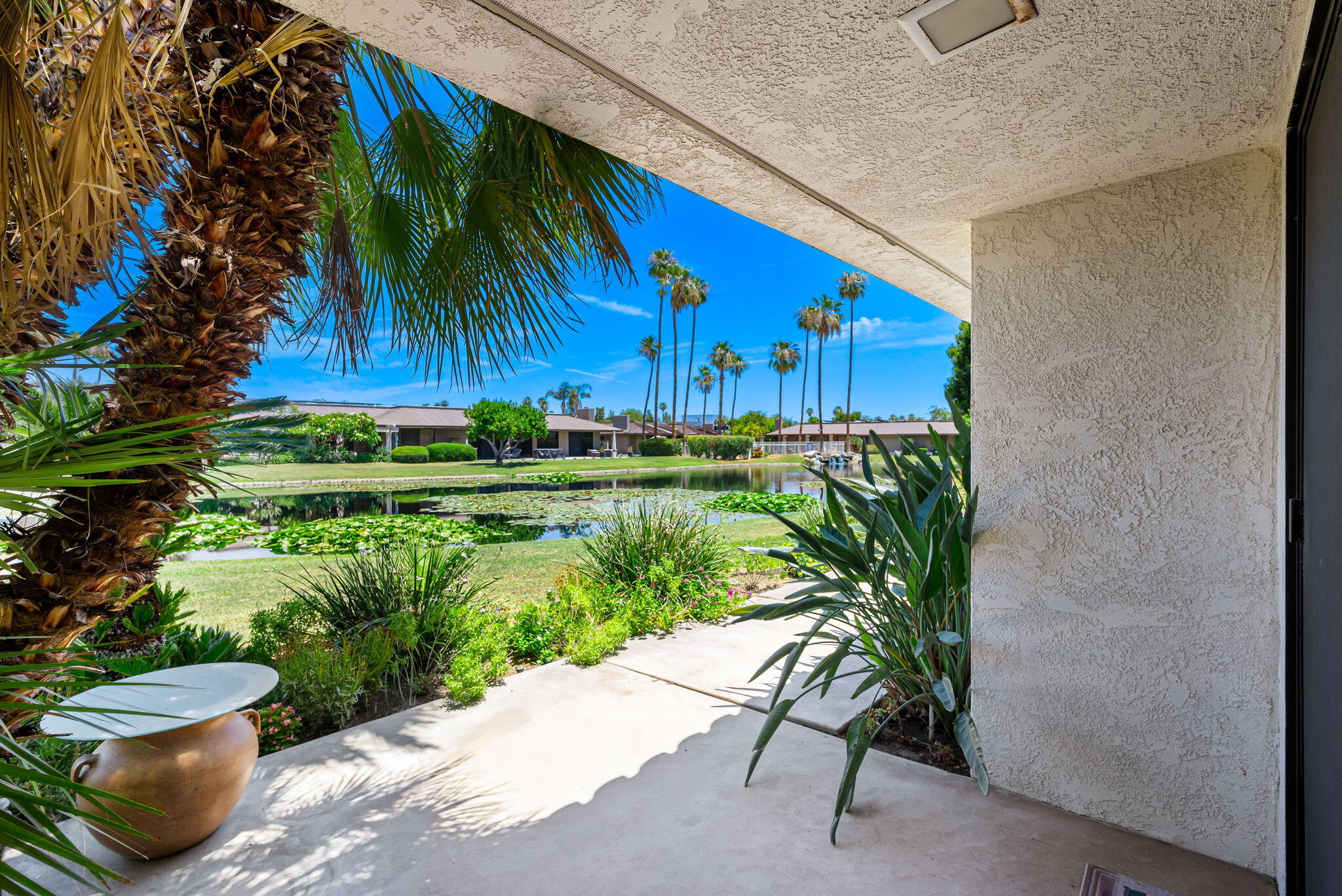 4 Reed Court Rancho Mirage, CA 92270 - Photo 42 of 42 a view of a backyard with plants and a patio
