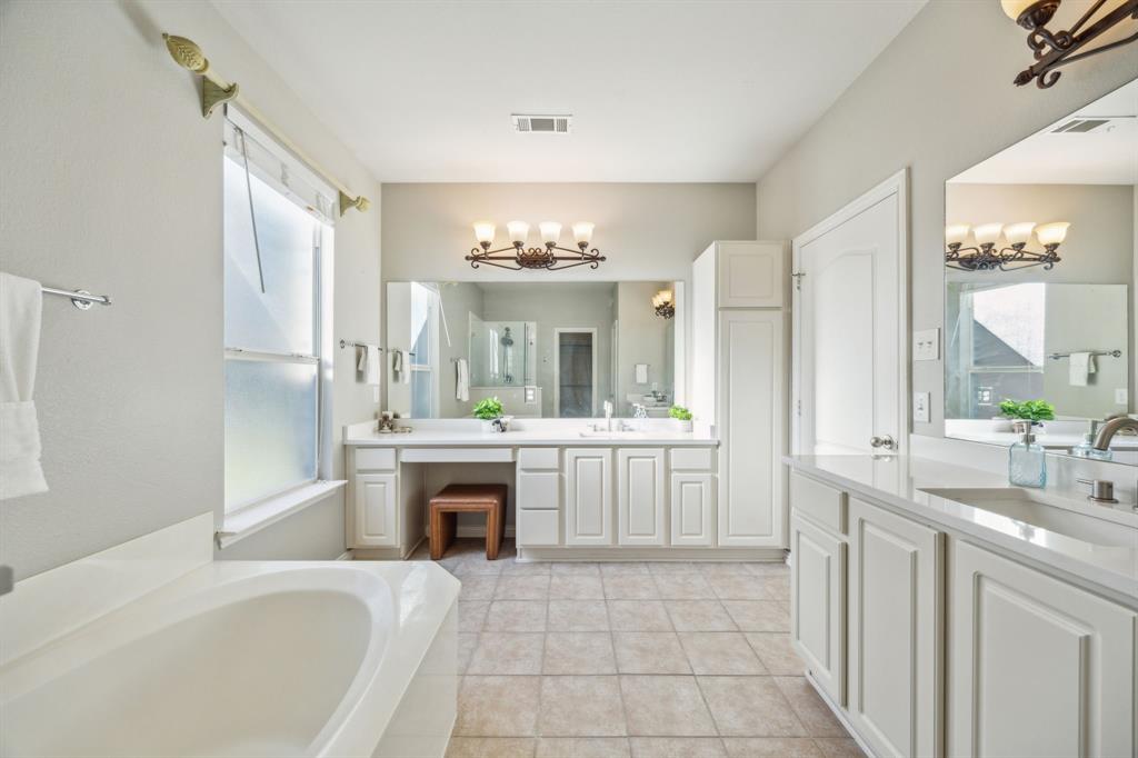 1302 Briar Ridge Drive Keller, TX 76248 - Photo 16 of 39 a spacious bathroom with a sink double vanity and a mirror