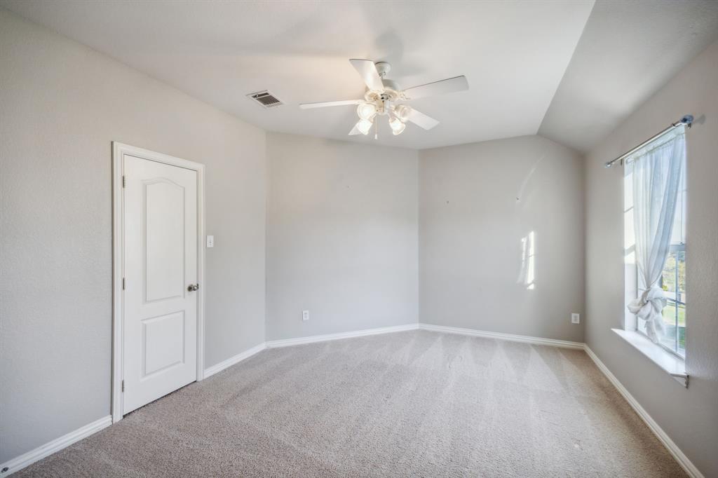1302 Briar Ridge Drive Keller, TX 76248 - Photo 27 of 39 wooden floor in an empty room with a window