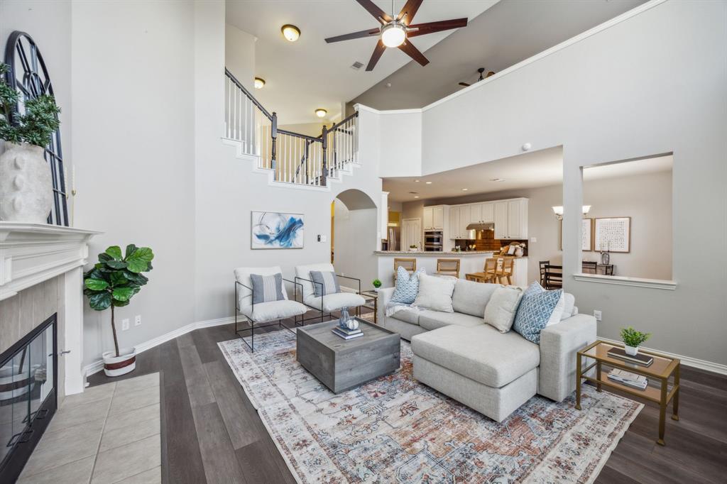1302 Briar Ridge Drive Keller, TX 76248 - Photo 5 of 39 a living room with furniture kitchen view and a potted plant