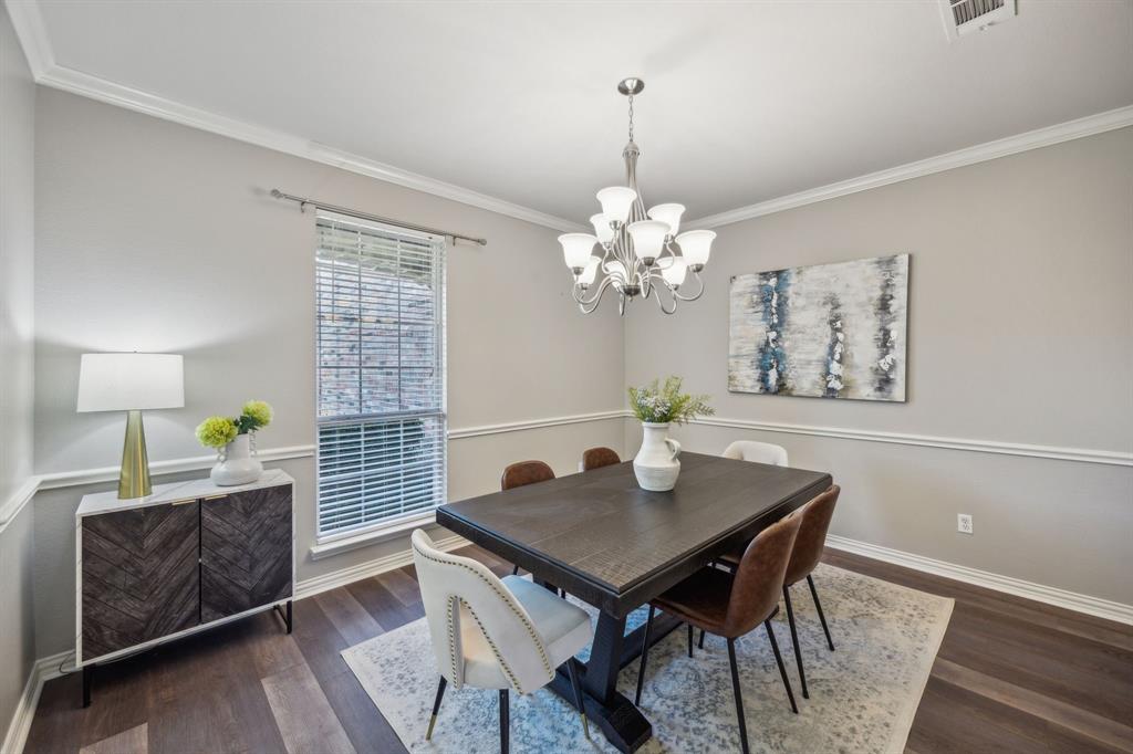1302 Briar Ridge Drive Keller, TX 76248 - Photo 9 of 39 a view of a dining room with furniture and chandelier