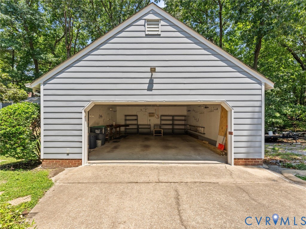 3524 Ludgate Road Chester, VA 23831 - Photo 31 of 44 Detached garage with horizontal siding, a gable ro