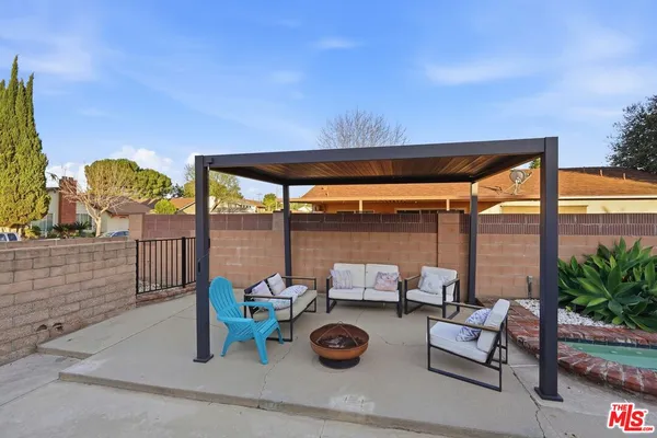 a front view of a house with patio