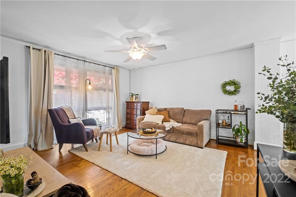 4220 Randolph Road Charlotte, NC 28211 - Photo 4 of 27 a living room with furniture and a large window