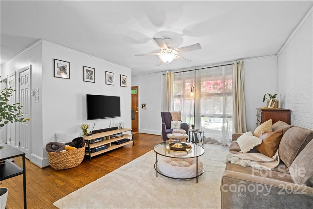 4220 Randolph Road Charlotte, NC 28211 - Photo 6 of 27 a living room with furniture and a flat screen tv