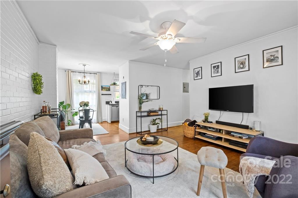4220 Randolph Road Charlotte, NC 28211 - Photo 8 of 27 a living room with furniture and a flat screen tv