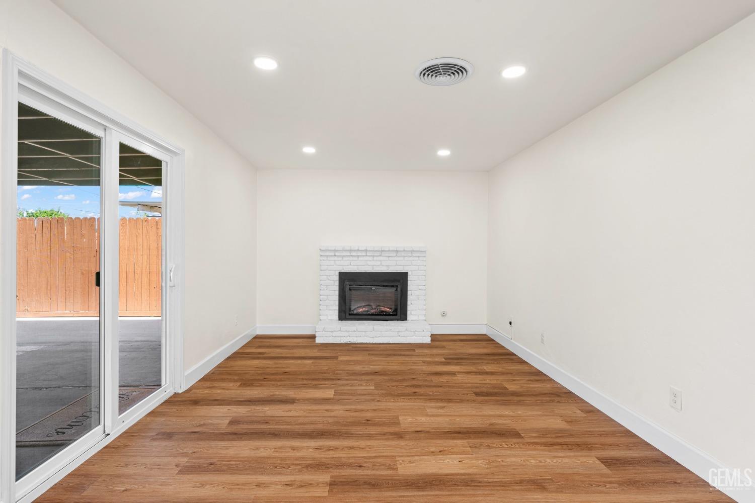 Undisclosed Address Bakersfield, CA 93307 - Photo 14 of 46 a view of an empty room with glass door