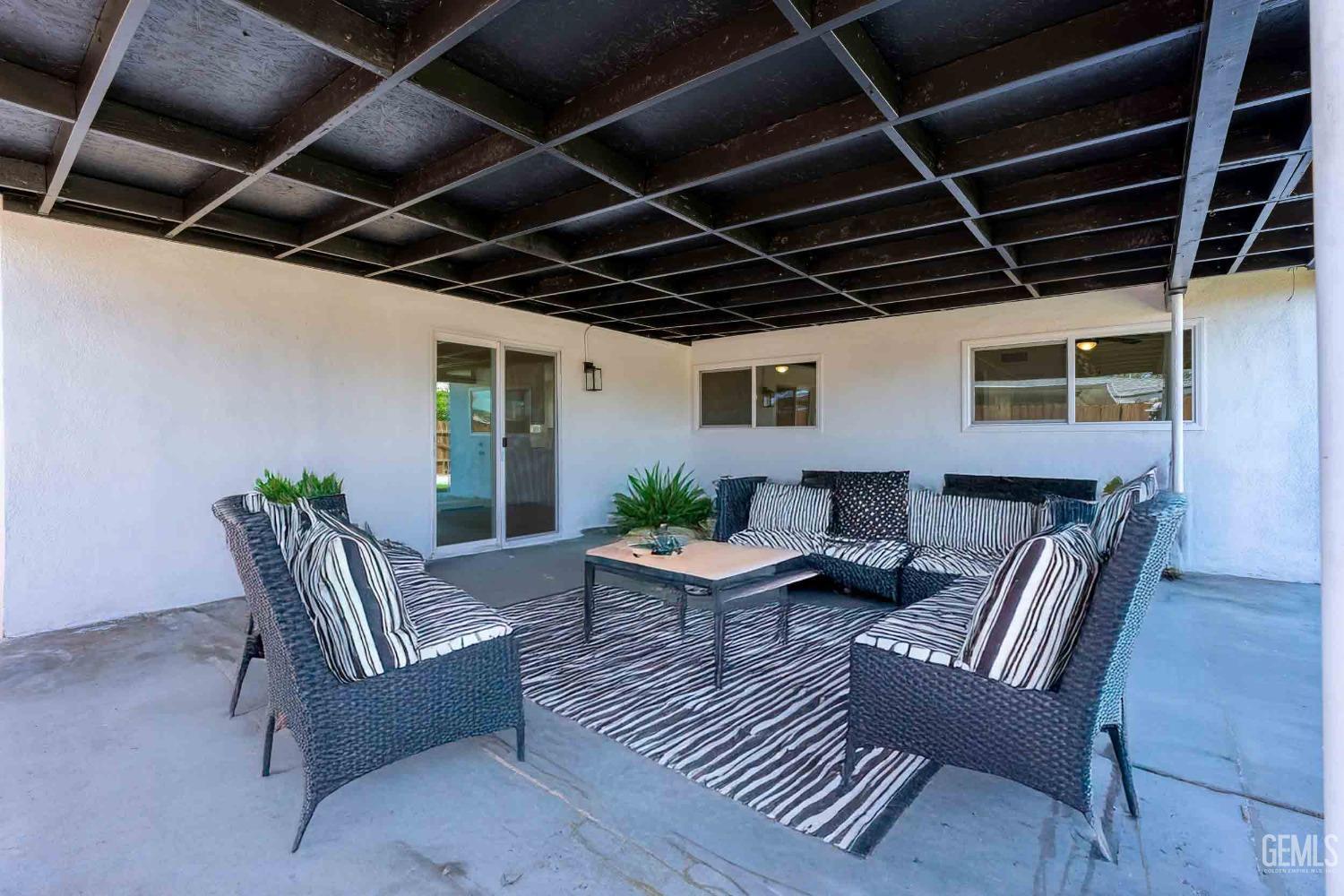 Undisclosed Address Bakersfield, CA 93307 - Photo 35 of 46 a outdoor living space with furniture and a couch