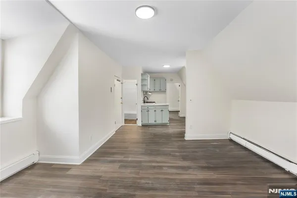 a view of kitchen with wooden floor