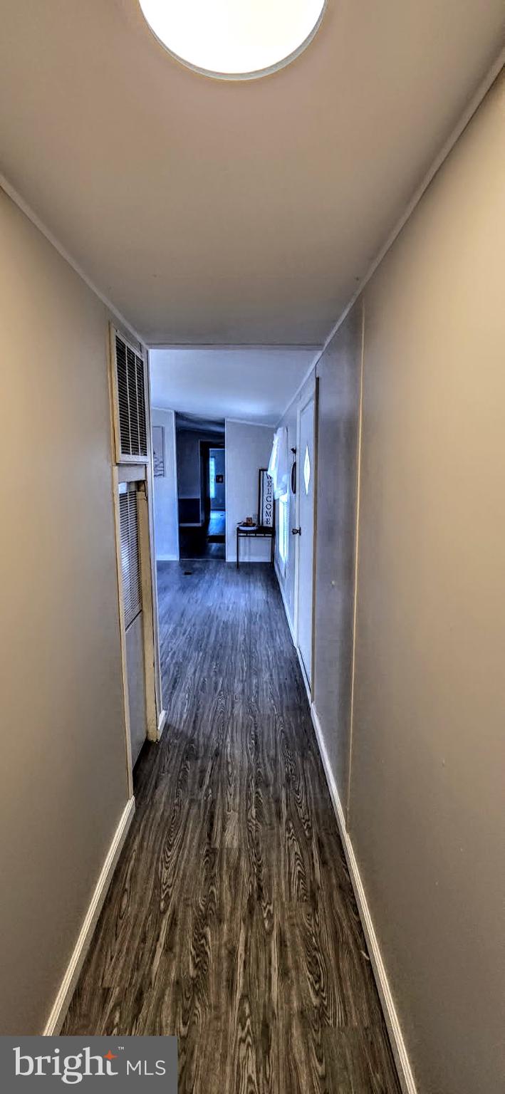 1923 Bennett Road Aberdeen, MD 21001 - Photo 9 of 20 a view of a livingroom with wooden floor and kitchen space