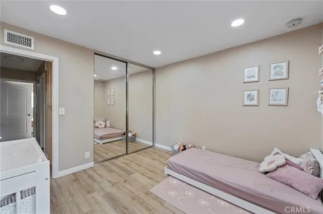 a room with a bed and furniture