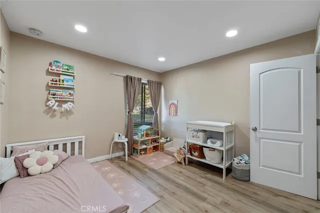 a room with furniture and a wooden floor