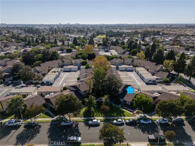 an aerial view of a city with lots of residential buildings