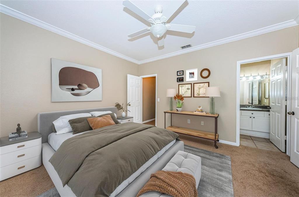 2254 Chianti Place, Unit 66 Palm Harbor, FL 34683 - Photo 9 of 20 a bedroom with a bed and a dresser