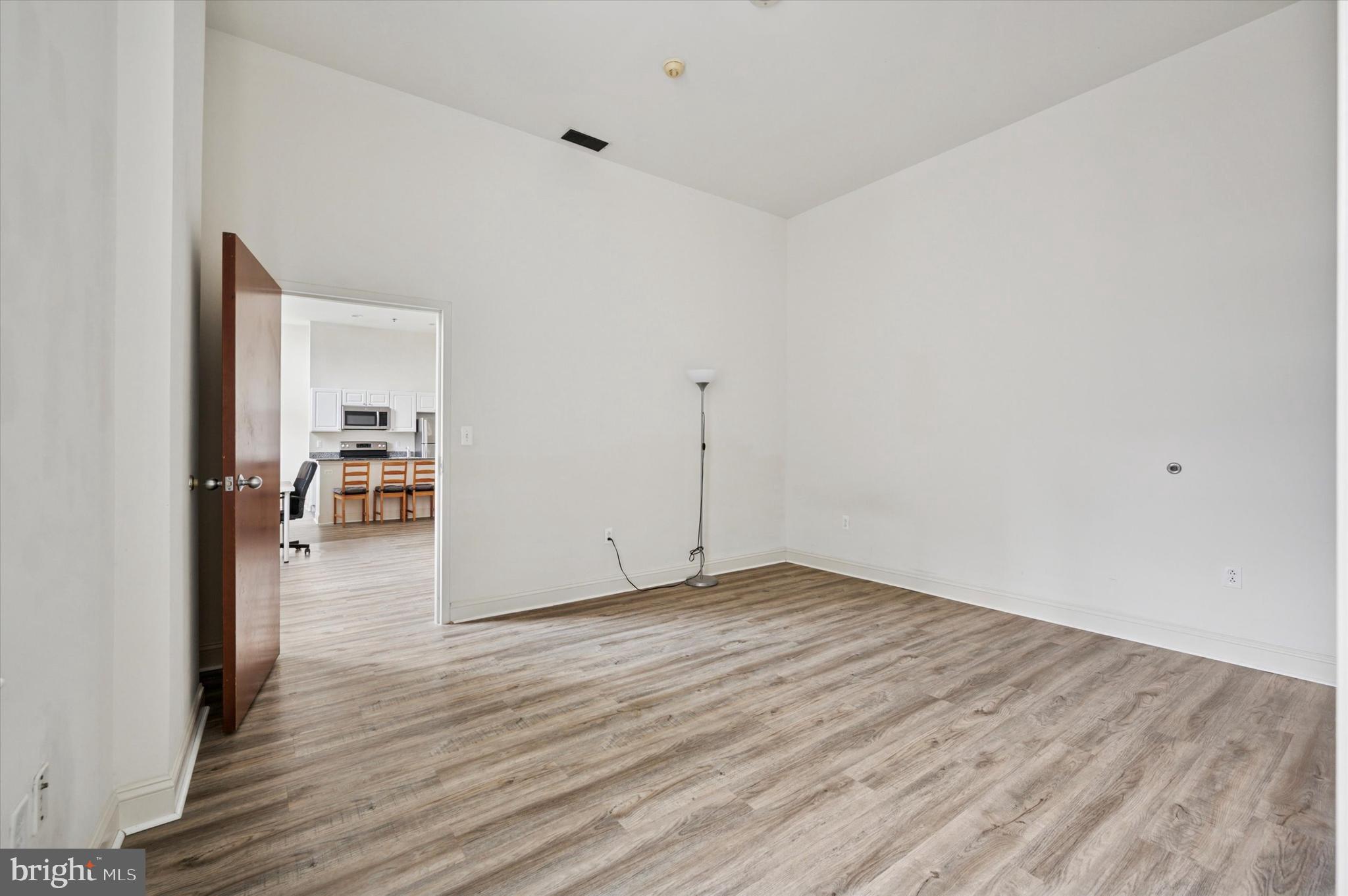 1001 Chestnut Street, Unit 904W Philadelphia, PA 19103 - Photo 15 of 25 a view of a livingroom with wooden floor