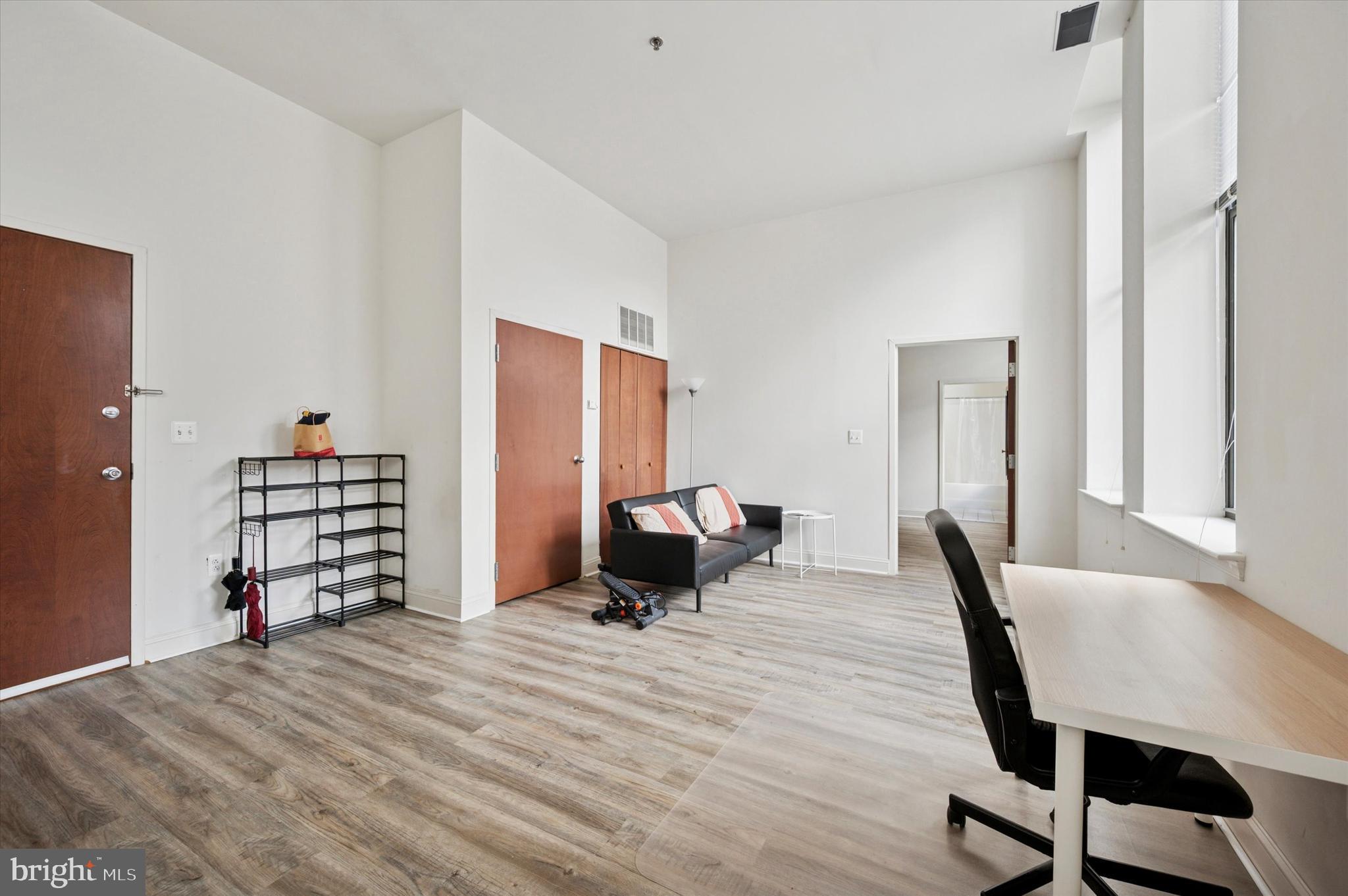 1001 Chestnut Street, Unit 904W Philadelphia, PA 19103 - Photo 3 of 25 a room with a bed and furniture