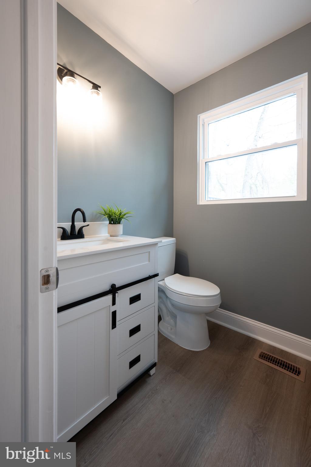 3 Slalom Court Pine Hill, NJ 08021 - Photo 38 of 47 a bathroom with a sink a toilet and a window